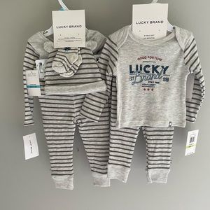 Lucky Brand 4 piece infant PJ set. Shirt, pants, socks and hat.